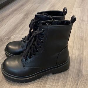 New never worn SODA black combat boots.